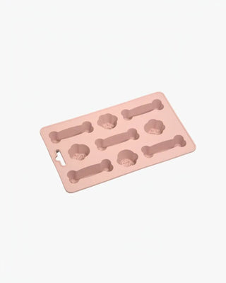 Hundinspiration Fiboo Iceboo glassform i rosa TPE-material med formar för hundben och tassar för svalkande godis.