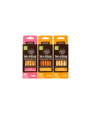 Hundinspiration No-Hide sticks 10-pack med smakerna lax, jordnötssmör och kyckling i tre stående förpackningar.