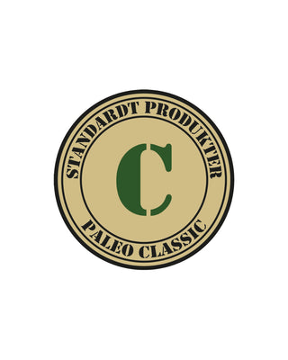 Hundinspiration Standardt Paleo Classic logotyp med ett grönt C i en beige cirkel för spannmålsfritt hundfoder